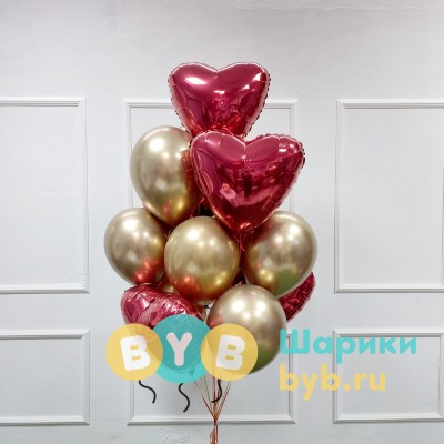 Фонтан из золотых шаров и красных сердец